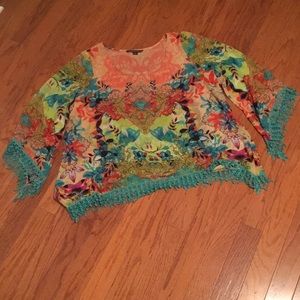 Beautiful print silky top ! This will go quick !